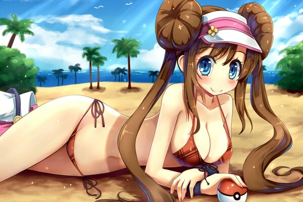 Fille en bikini posant sur la plage