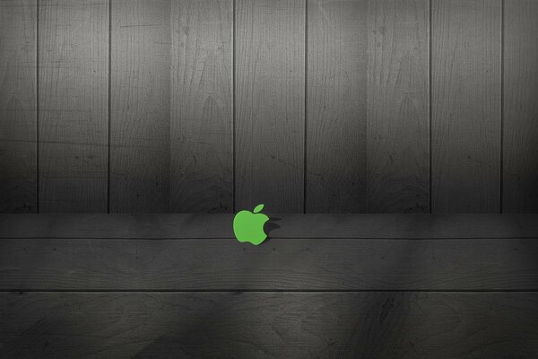 Logo apple vert sur fond de planches