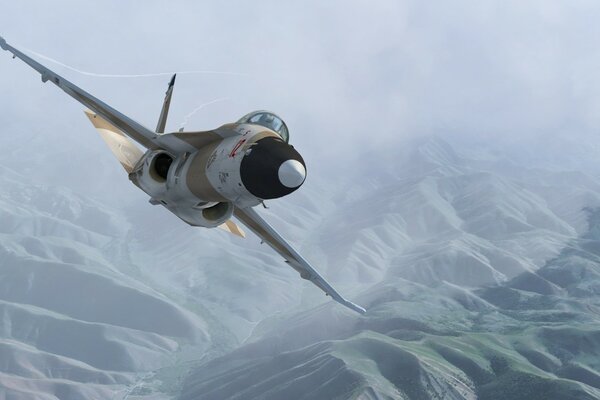 L avion vole au-dessus des montagnes