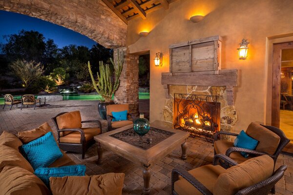 Véranda confortable et chaleureuse pour se détendre