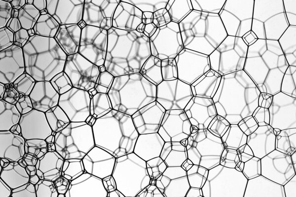 Bulles noires sur fond blanc style abstrait