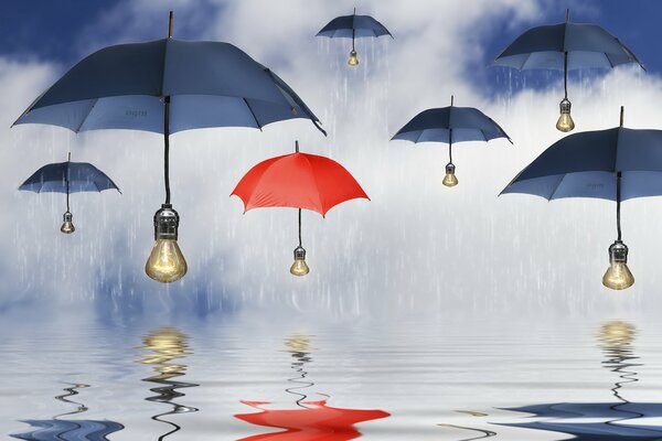 Parapluies bleu et rouge avec ampoule au lieu de poignées sous la pluie