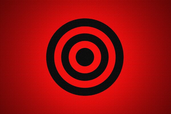 Cible noire sur fond rouge