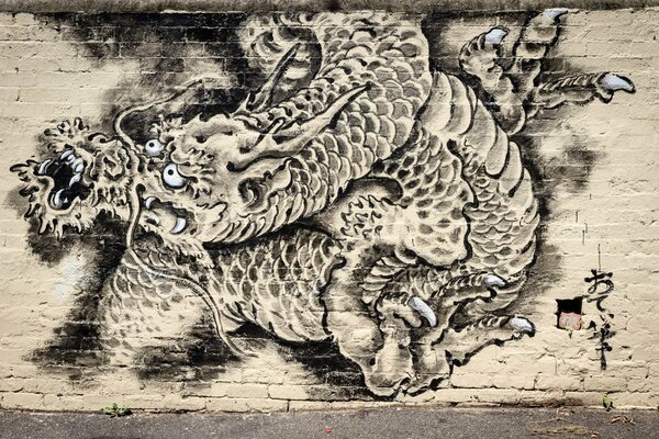 Graffiti dragon sur un mur de lumière
