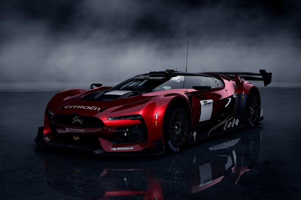 Gran turismo cinq sur fond de brouillard avec reflet dans le sol