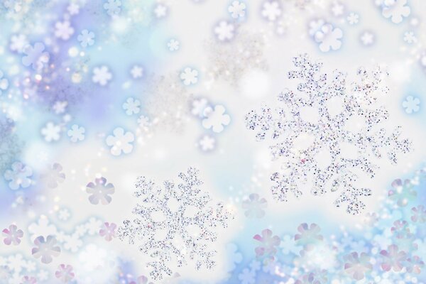 Flocons de neige brillants sur fond bleu et blanc